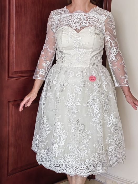 Suknia ślubna kremowa midi r.38"Chi Chi London " nowa