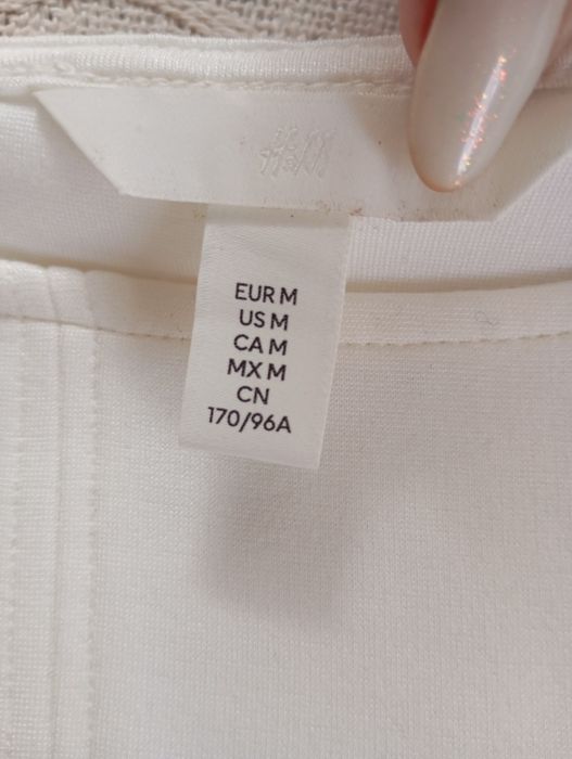 H&M r.M efektowny biały top gorsetowy bufiasty rękaw