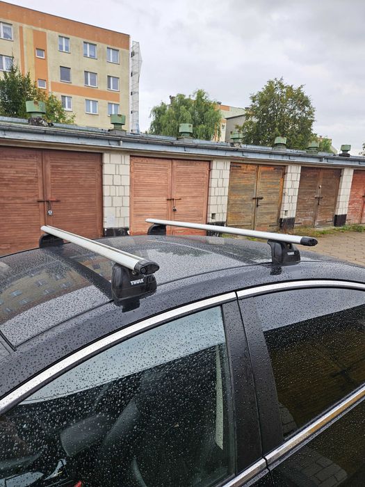 Bagażnik dachowych Thule, uchwyty rowerowe Aguri
