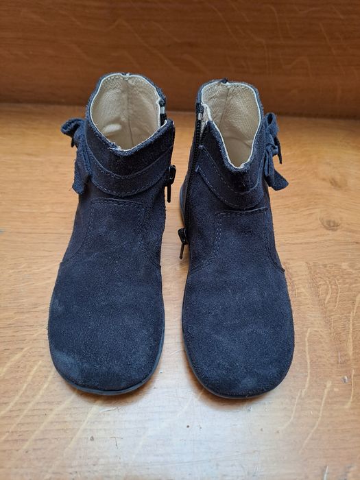 Botas em pele por dentro