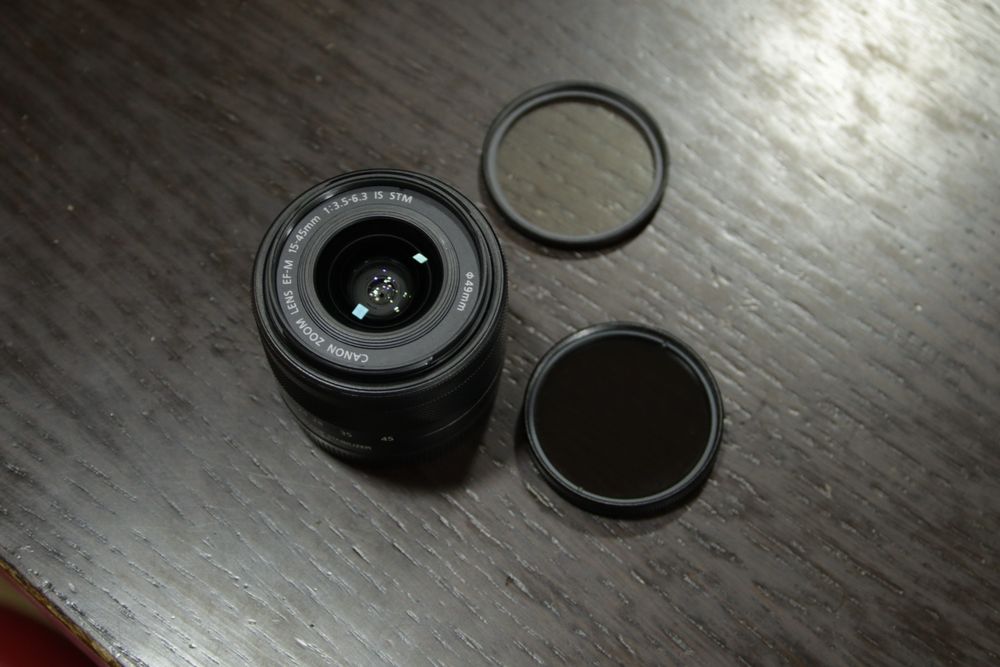 objetiva canon 15 45mm com image stabilizer + filtro de proteção e cpl