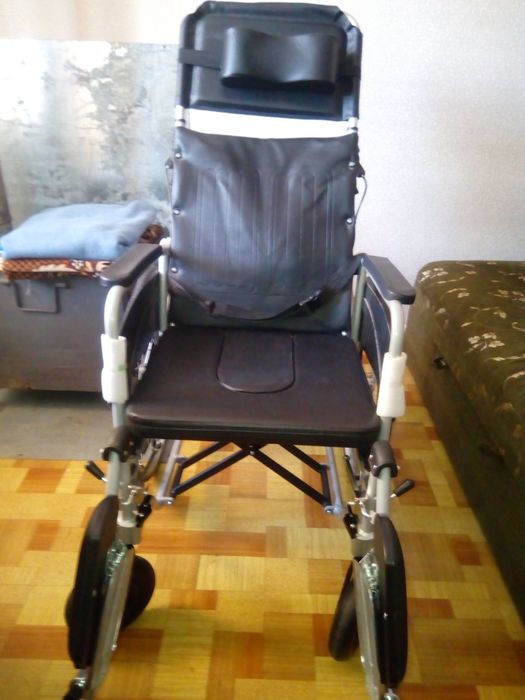 Инвалидная коляска .
