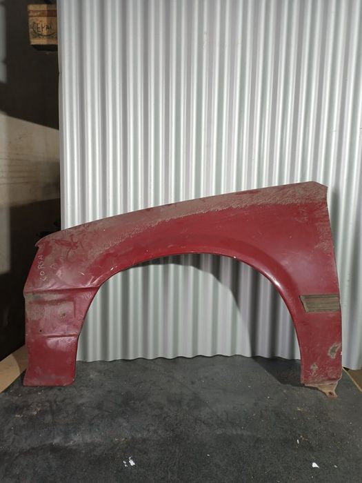Guarda Lamas Opel Corsa A ESQUERDO  Vermelho