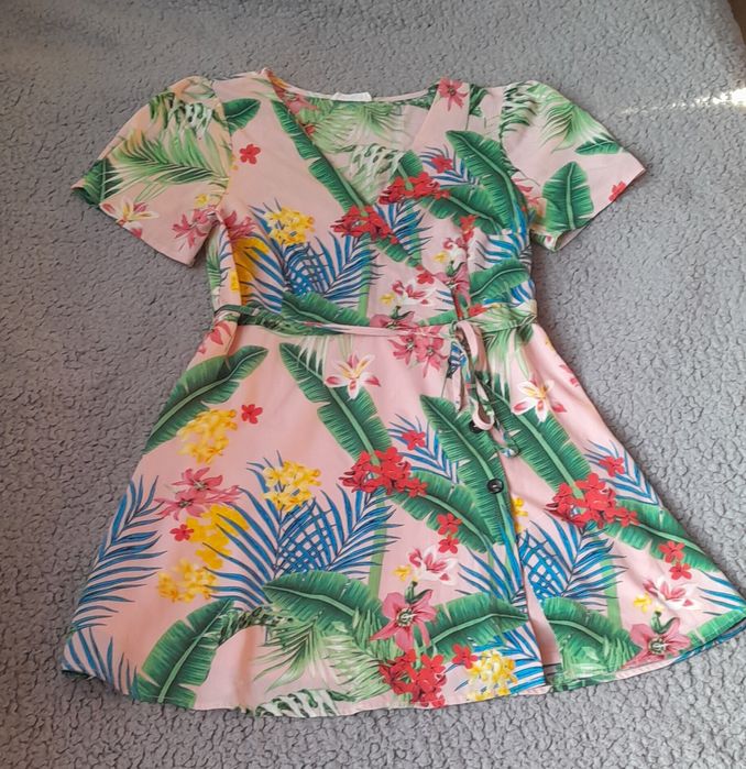 Sweter w kolorowe paski