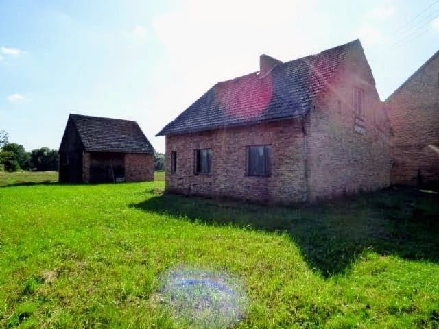 Działka z zabudowaniami