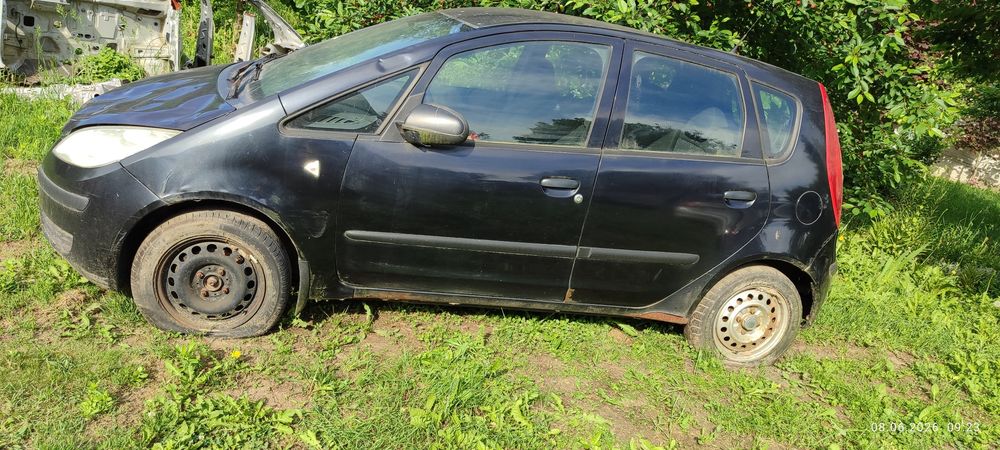 Б/в кузовні запчастини mitsubishi colt