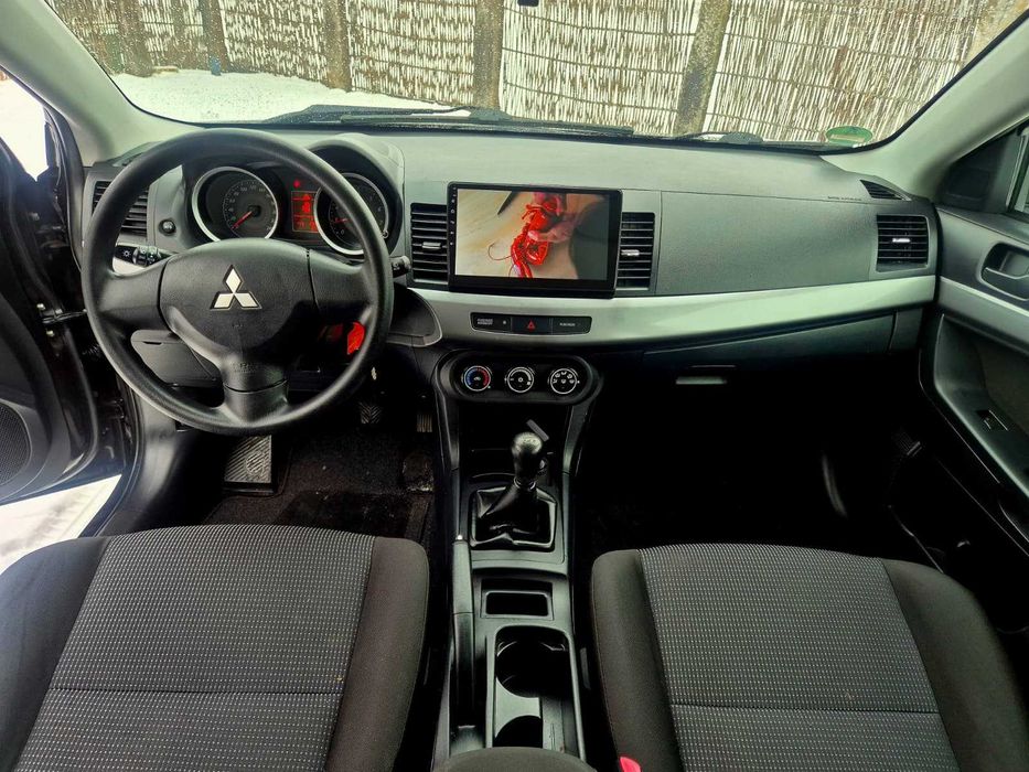 Mitsubishi Lancer Benzyna 109 KM 5-drzwiowy HB 2010r