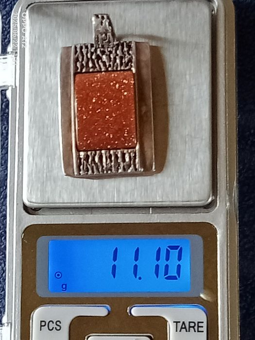 Srebrna zawieszka z piaskiem pustyni