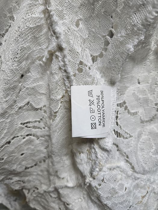 Vestido branco de renda estilo boho