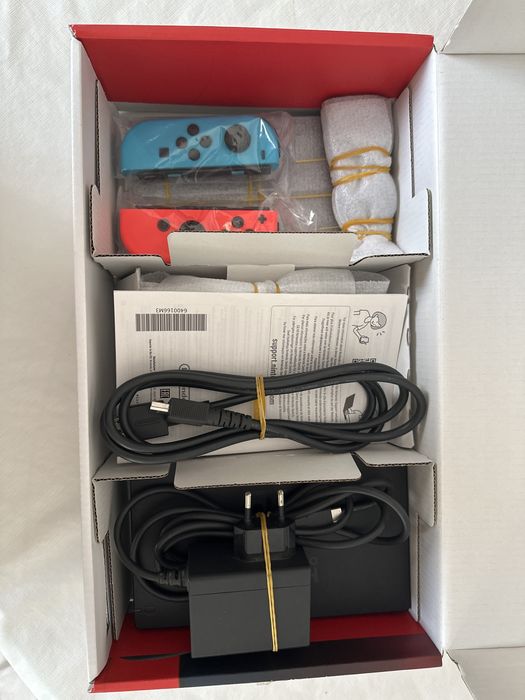 Nintendo Switch + 8 jogos