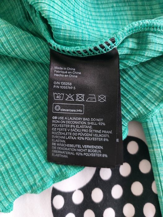 Zielona bluzka ze srebrnym elementem H&M divided