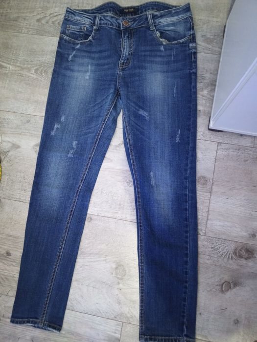 Spodnie jeansowe damskie w rozmiarze 40