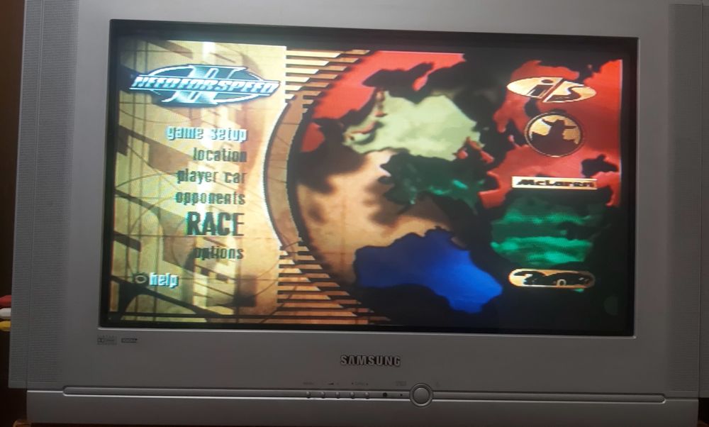 Ps1 fat com vários jogos 2 comandos originais e cartão de memória.