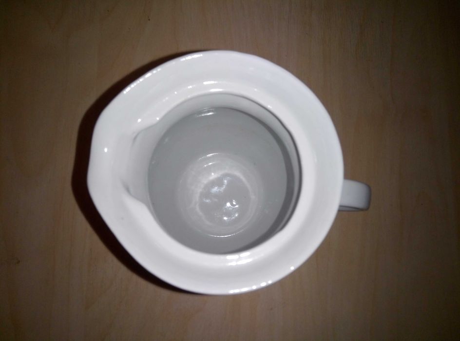 Фарфоровий кувшин с птицами