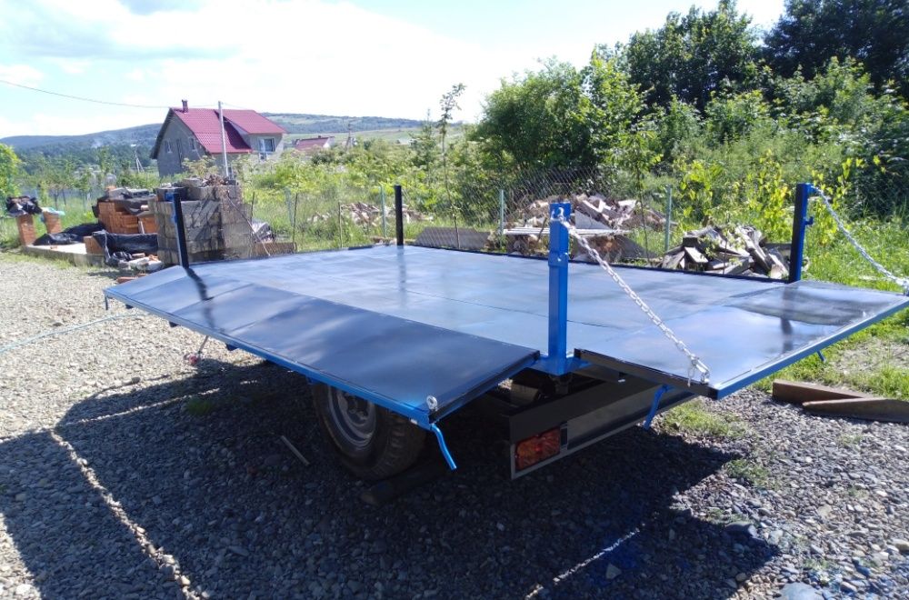 продаж прицепів .