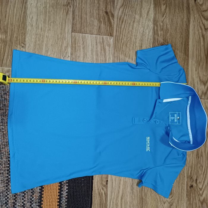 Футболка на девочку , состояние нового