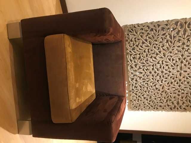 Sofás individuais em pele