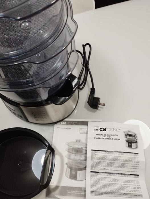 Panela de cozer a vapor em estado perfeito