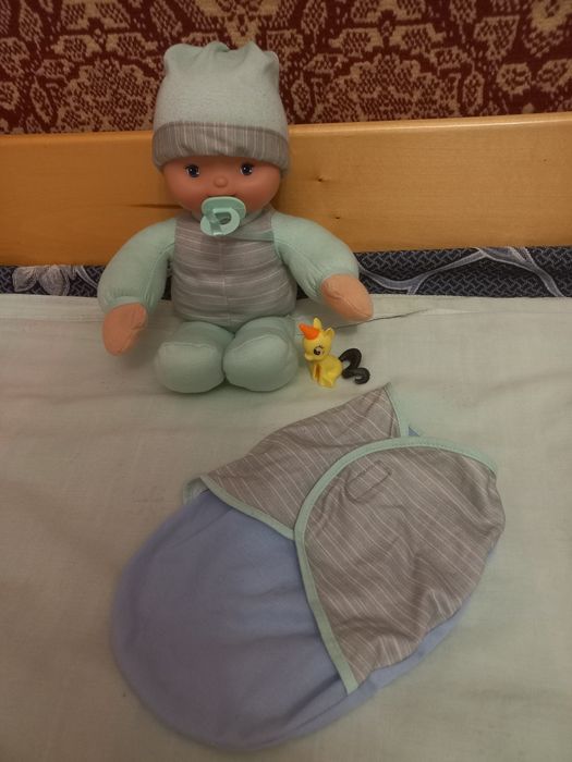 Интерактивный пупс мягконабианой ,ростом 35 см.