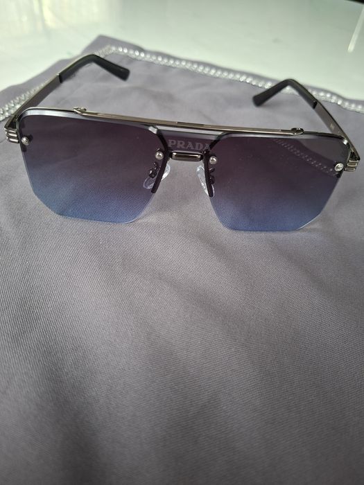 Męskie okulary przeciwsłoneczne Prada. Wyprzedaż