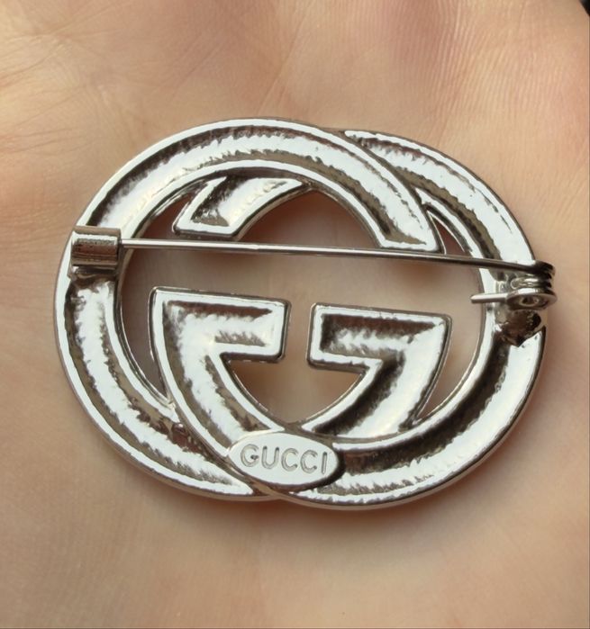 Broszka Gucci srebrna z cyrkoniami