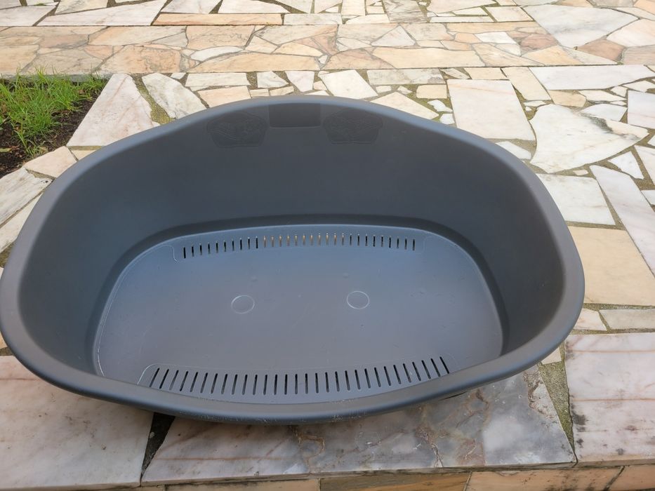 Cama cão plástica como nova