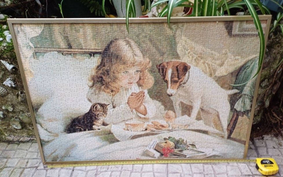 Puzzle, quadro. Menina a rezar com cão.