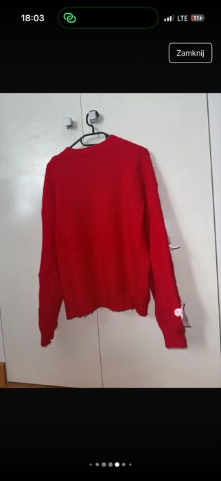 świąteczny sweter czerwony w kokardki