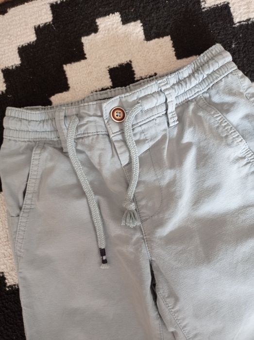 Spodnie bawełniane, eleganckie i wygodne. Reserved 110