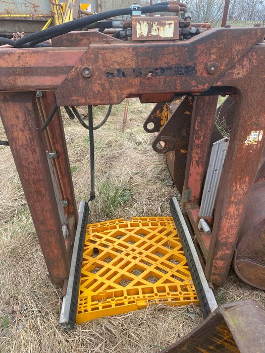 Chwytak hydrauliczny do palet łyżki do koparki