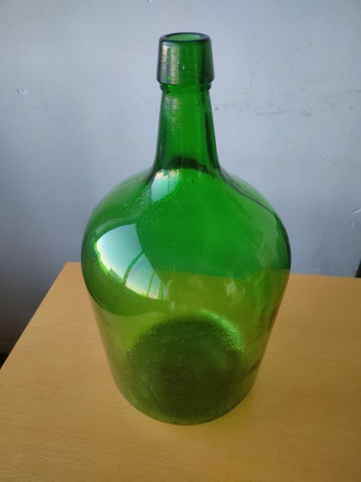 Conjunto de garrafões de vidro vintage.