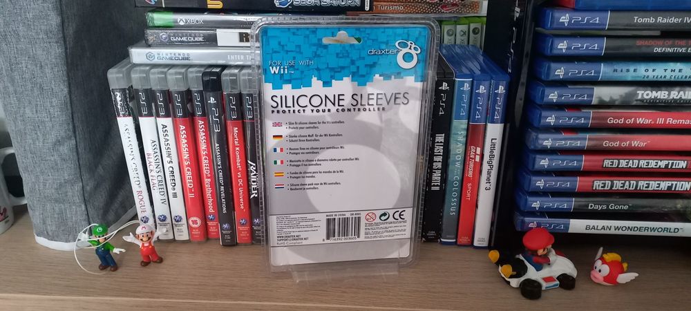 Conjunto de proteções de silicone para controladores de Wii

- Cor az