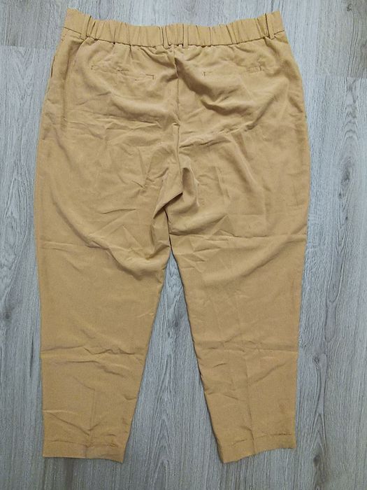 Фирменные брюки Mango