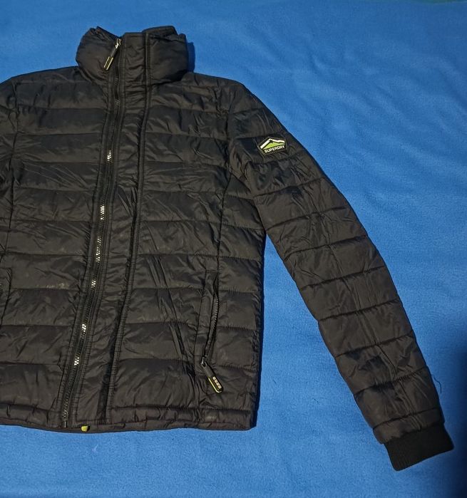 Blusão quente em bom estado com bolsas com fecho64741029445763123