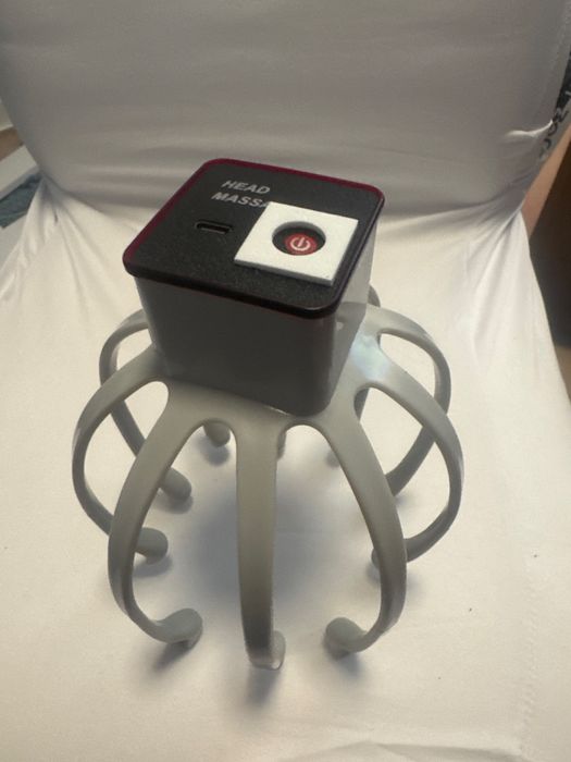 Elektryczny masażer do głowy