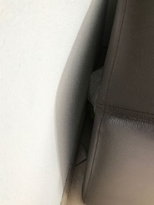 Sofá de canto em pele castanho