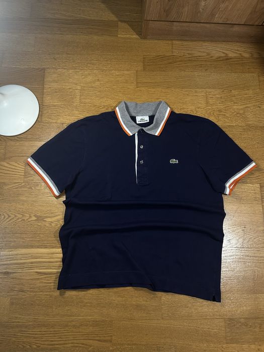 Футболка поло від Lacoste в розмірі S , стан ідеальний