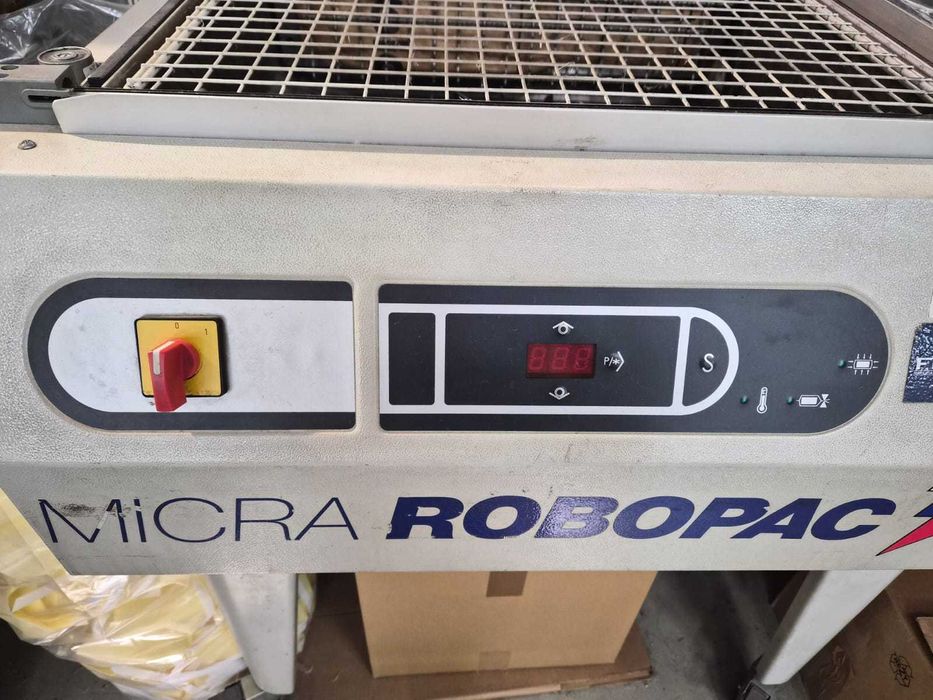 Máquina de embalar retrátil