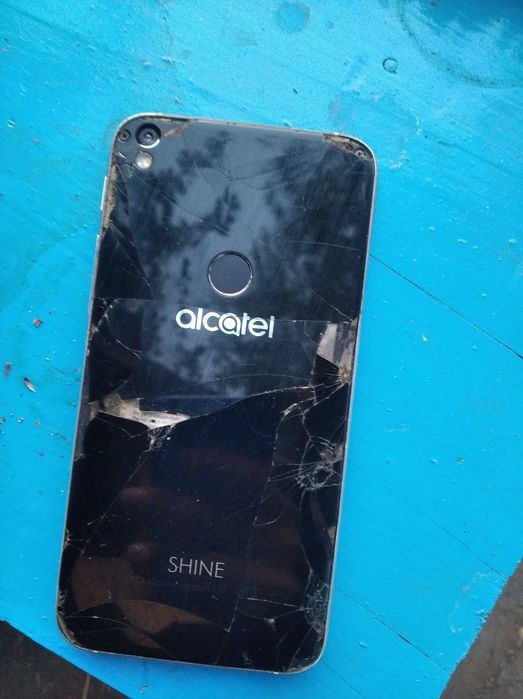 Alcatel SHINE  алкатель