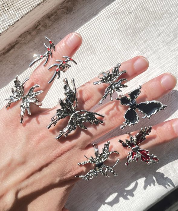 кільця з метеликами