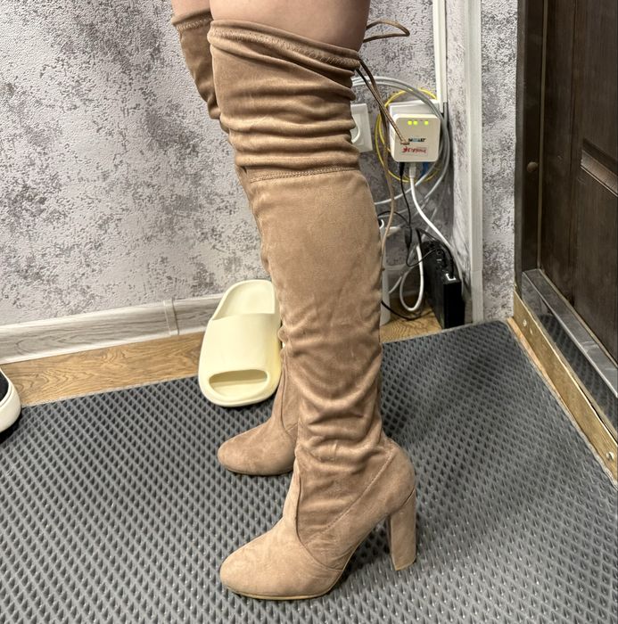 Ботфорти на підборах