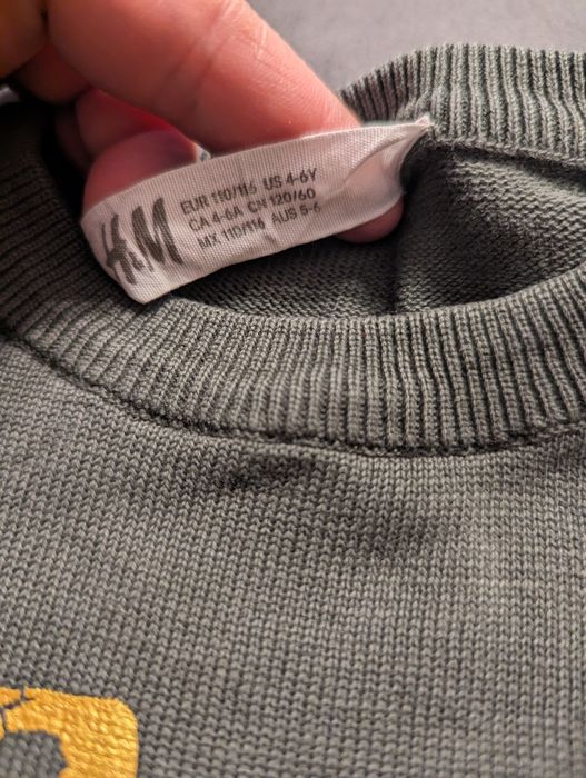 110 h&m sweterek zielony złoty dinozaur 110-116 bdb