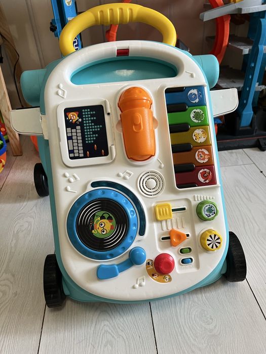 Ігровий центр-ходунки (каталка) Baby Einstein 4 в 1 Mix Roll (толокар)