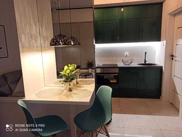 Mały apartamencik z ogródkiem