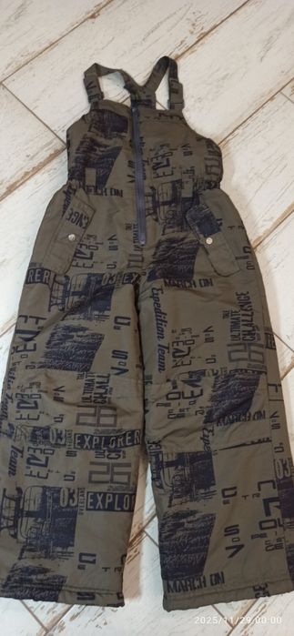 Ciepłe zimowe spodnie na szelkach 116 dla chłopca