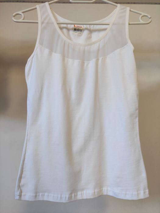 Biała bluzka Donella bez rękawów
