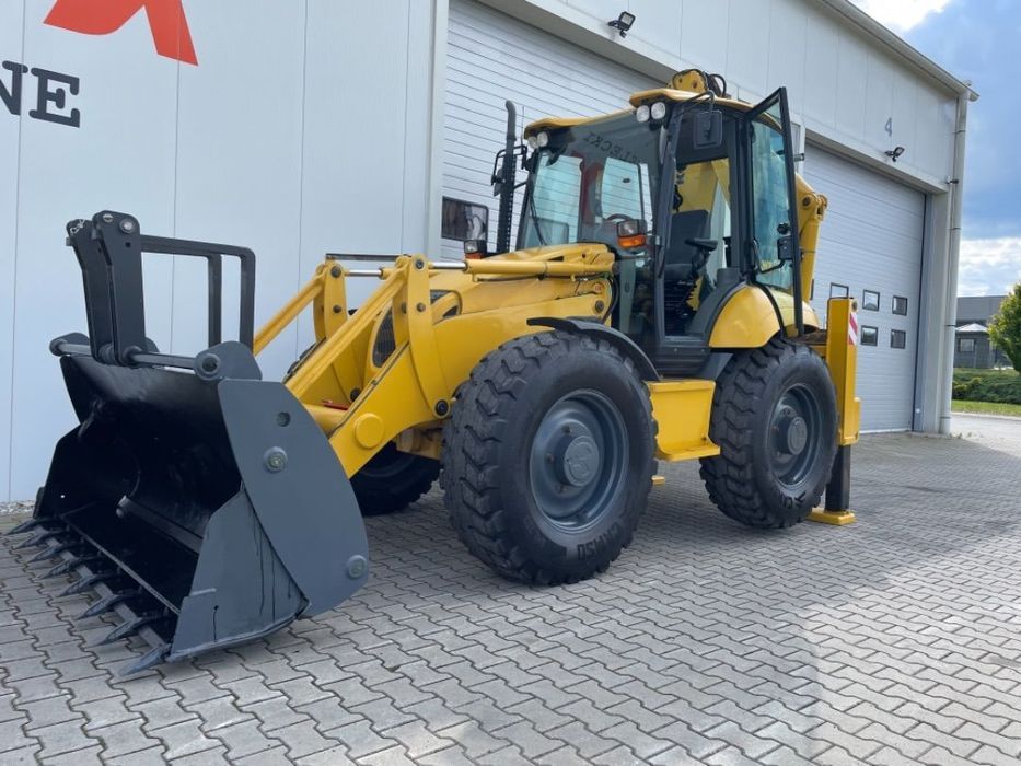 Komatsu WB97s  Rodzynek Yojstic powershift ppc control koparko ładowarka