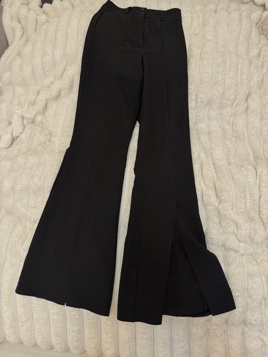 Брюки клеш з розрізом