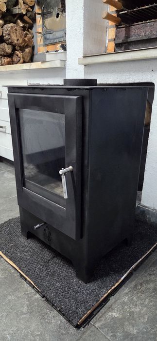 Salamandra a lenha usada em excelentes condições