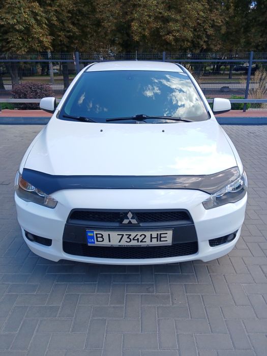 Mitsubishi Lancer 2009 VIN JMBLTCX3A9U002885 фото оголошення 4 з 18